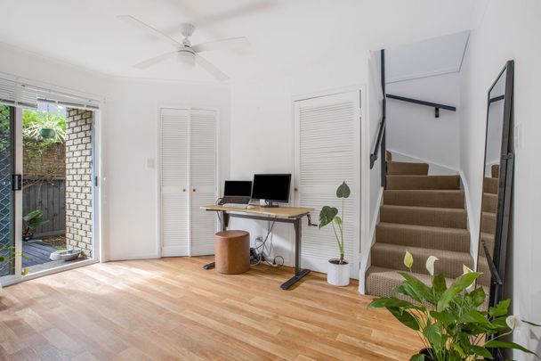 Neat and Tidy Townhouse in Great Location! - Photo 1