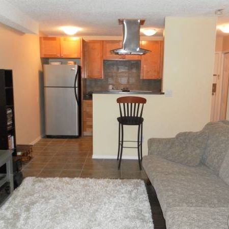 Beautiful Sunalta Condo - $400 OFF your First Month! - Photo 1