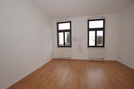 Geräumige Erdgeschoss-Wohnung mit saniertem Bad und Balkon - Foto 3