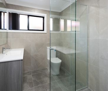 FULLY RENOVATED COASTAL HOME NEAR THE BROADWATER - Photo 3