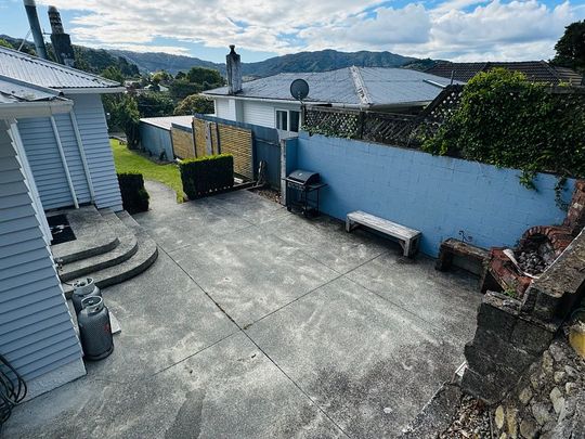 Family Home 11 Holland Street, Wainuiomata - Photo 1
