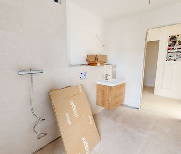 Hochwertige 2-Zimmer-Neubauwohnung in ruhiger Lage von Germering mi... - Foto 4