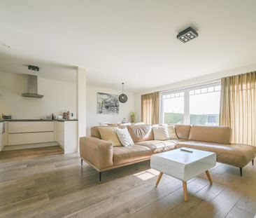 Gelijkvloers éénslaapkamerappartement met tuin en carport op de Bos... - Photo 3