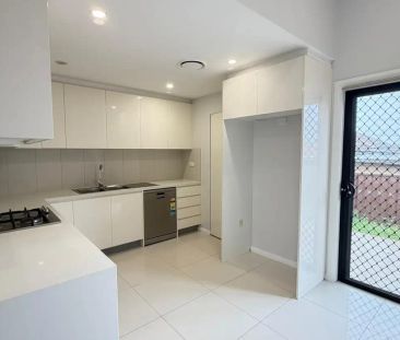 “Modern 4-Bedroom, 3-Bathroom Home – Freshly Painted with New Carpets” - Photo 3