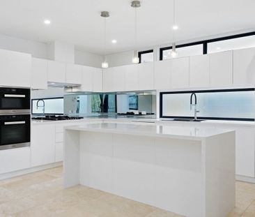 ELEGANT FAMILY LIVING WITH PREMIUM FINISHES & DISTRICT VIEWS - Photo 2