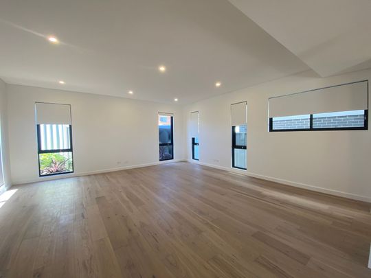 Modern Coastal Townhouse with Quality Finishes - Photo 1