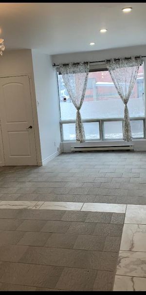 Appartement Rdc stationnement privé - Photo 1