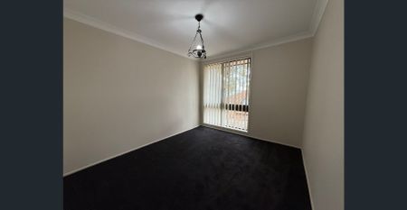 Beautiful Renovated 4-Bedroom Home | Schools & Shops only seconds away - Photo 2