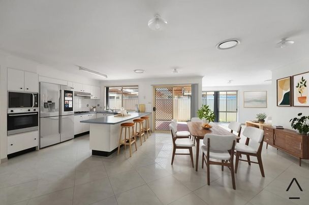 Discover your perfect family retreat, nestled in the heart of Casula! - Photo 1