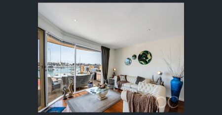 Open the Door to Waterfront Luxury and Marina Views - Photo 3