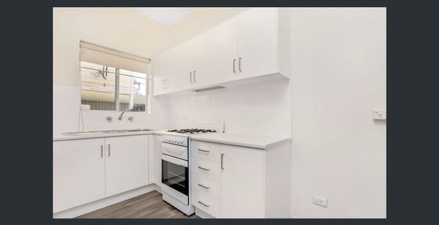 Prime Location! Step into Comfort and Style with This Beautifully Presented 2 Bedroom Unit! - Photo 1