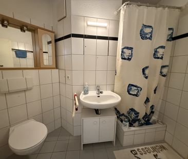 Hübsche 1 Zi.-Wohnung, teilmöbliert, nur wenige Gehminuten vom Haup... - Foto 1