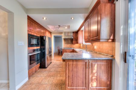 1 Rue Alpha, Dollard-des-Ormeaux, QC H9G - Photo 5