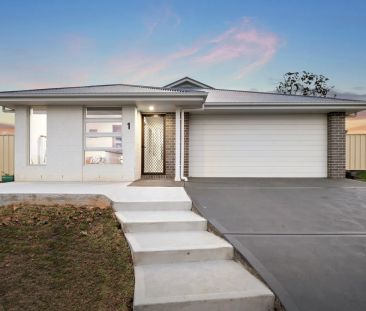 Embrace an Idyllic Lifestyle in this As-New Family Retreat - Photo 3