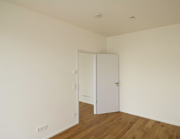 *ERSTBEZUG* Lichtdurchflutete 2-Zimmer Wohnung mit Balkon direkt am Kocher! - Foto 1