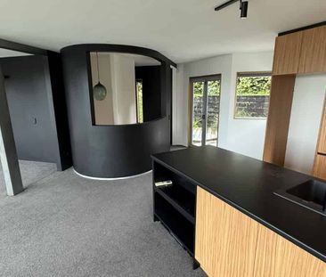 Modern Two-Bedroom Townhouse with Expansive Lake Views - Photo 2