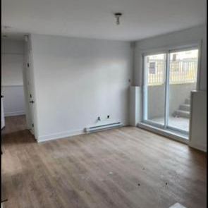 4 1/2 à louer à Saint Paul près de tous les services CADEAU DES PROPRIO!!! DERNIER MOIS DE LOYERS GRATUIT - Photo 1