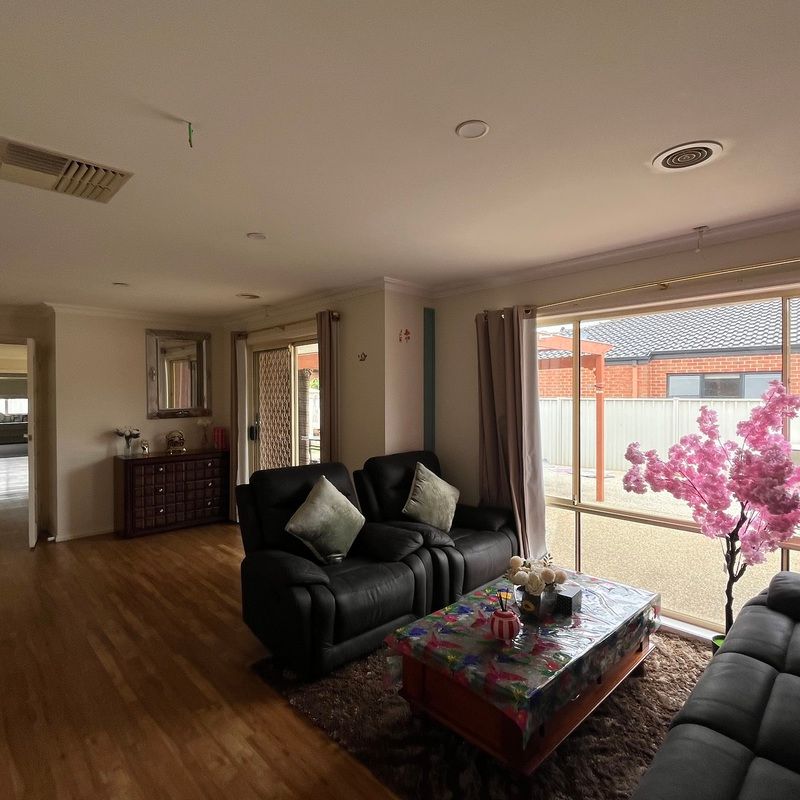 Modern 4-Bedroom Home with Multiple Living Areas - Photo 1