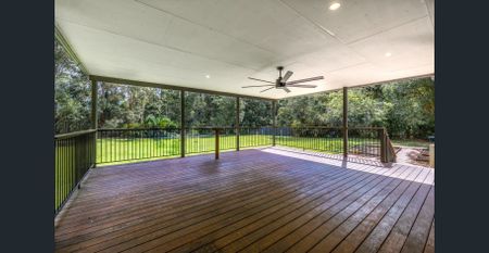 Spacious Hinterland Living with Expansive Deck and Yard - Photo 2
