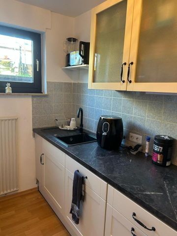 Souterain Wohnung - Photo 2