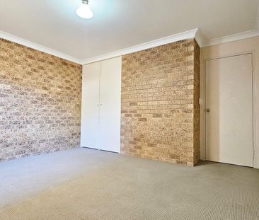 Comfortable Two-Bedroom Unit With A Courtyard - Photo 3