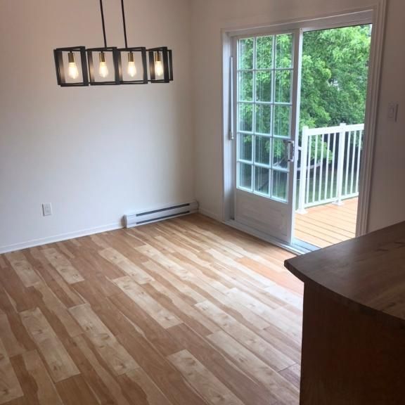 Haut de duplex Grand 51/2 lumineux immense terrasse - Photo 1