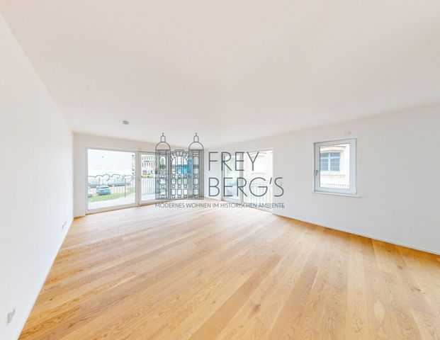 Neubaukomfort: Stilvolle 1-Zimmer-Wohnung mit Einbauküche und Balkon - Photo 1