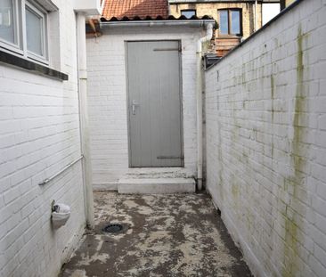 Opgefriste rijwoning met stadskoertje - Photo 3