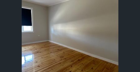 Family Home with Modern Comforts and Spacious Backyard - Photo 5