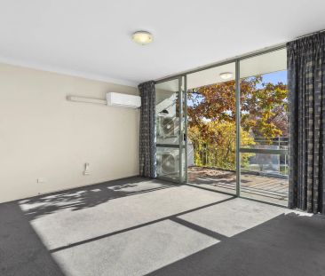 Top Floor Apartment in Prime Location - Photo 1