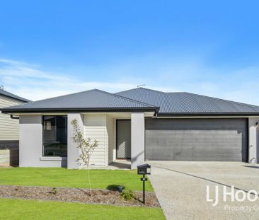 Brand New Family Home with Two Living Areas in a Thriving Location - Photo 1