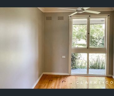 SUN-FILLED FAMILY HOME WITH DECK, GARDEN & BONUS SUNROOM! - Photo 1