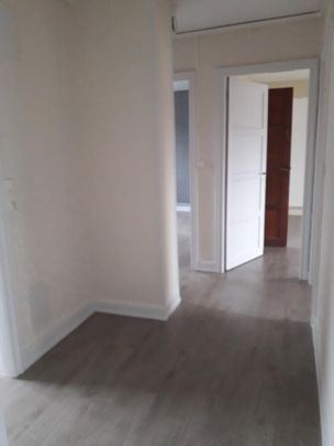 Location : Appartement 4 pièces 79 m2 – BEAUCOURT - Photo 1