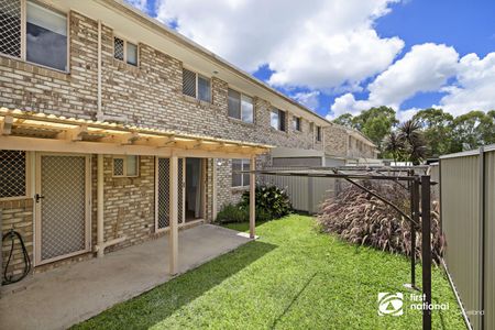 RECENTLY RENOVATED TOWNHOUSE IN GREAT LOCATION! - Photo 2