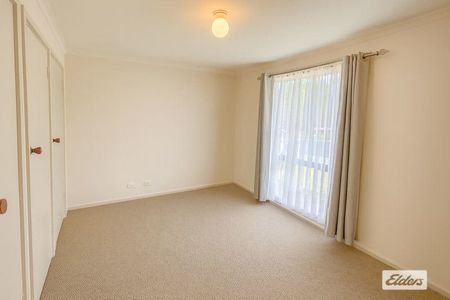 Freshly updated and low maintenance living - Photo 3