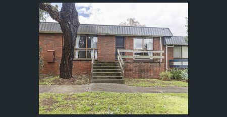 SPACIOUS TWO-BEDROOM UNIT IN QUIET, CONVENIENT LOCATION - Photo 2