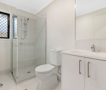 STYLISH & MODERN 2BED HOME WITH LARGE FULLY FENCED BACKYARD - Photo 6