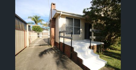 Neat & Spacious Home in a Convenient Revesby Location - Photo 2