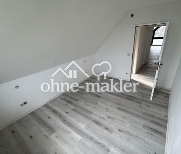 Sehr schöne modernisierte 2 Zimmer Dachgeschosswohnung inkl. Tiefga... - Foto 1