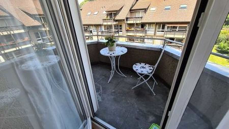 Generous penthouse apartment with balcony! 1st month FREE! - Photo 3