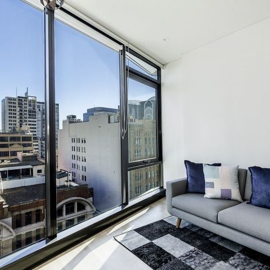 SOPHISTICATED CITY PAD WITH STORAGE CAGE | Furnished - Photo 1