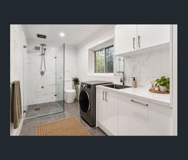 Stylish Three-Bedroom Home in Convenient Location - Photo 6