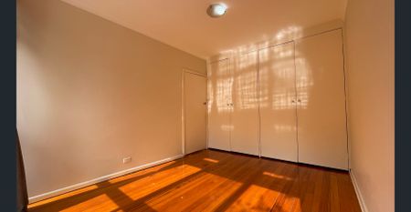 Bright 2-Bedroom Unit with Private Courtyard, Carport & Storeroom - Photo 2