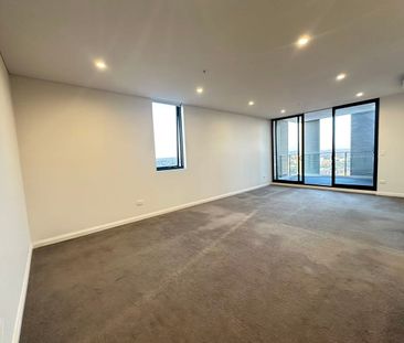 NEAR NEW 2 BED APARTMENT WITH VIEWS - Photo 6