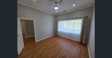 Luxuriously renovated home with landscaped gardens & security system - Photo 2