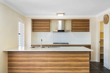 “Spacious 4-Bedroom Family Home + Study + Media. Solar Included!” - Photo 2