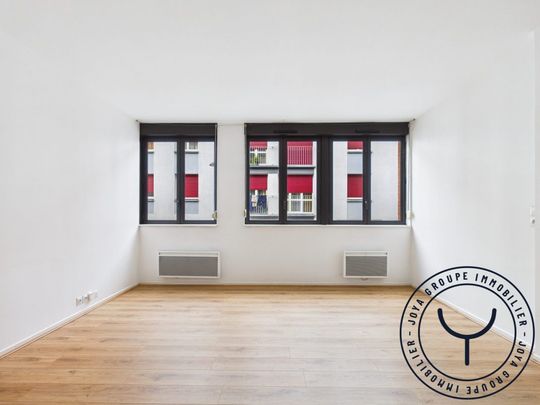 En plein centre ville avec stationnement - Photo 1