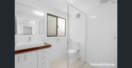 Beautifully Renovated 4 Bedroom Home in Prime Location complete with partial water views! - Photo 2