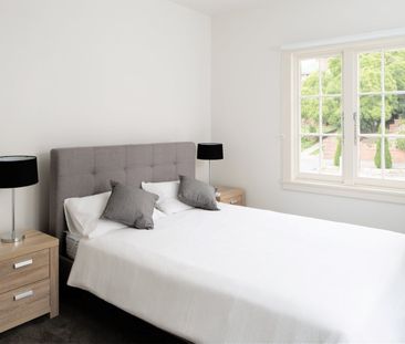 Updated and Fully Furnished - Photo 6