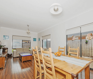 Spacious Family Home with Private Backyard & Double Garage - Photo 1